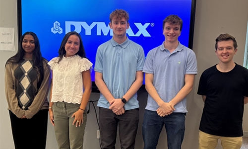 Dymax and Bomar interns gather together for a group picture.